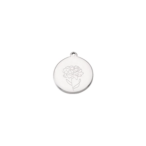 Detailed view of silver stainless steel round pendant with engraved carnation flower