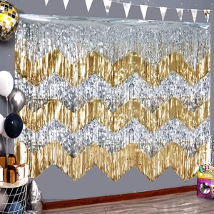 Gold and silver wavy tinsel curtain backdrop for party wall decoration and celebrations