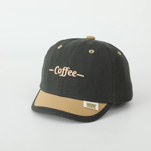 Detail view of cotton baseball cap showing coffee embroidery and contrast stitching