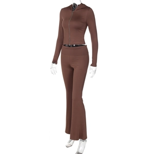 Detailed view of women's brown slim-fit zip-up hoodie and matching flared pants set
