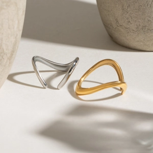 Minimalist wave geometry open rings in gold and silver finish with stone accents