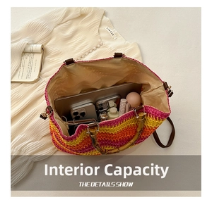 Spacious interior of gradient woven straw bag showing items for beach vacation