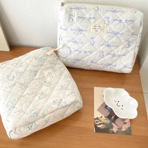 Floral quilted cotton makeup bags with zipper in blue animal and green flower patterns