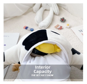 Detailed interior view of plush cow patterned bag showing practical storage capacity