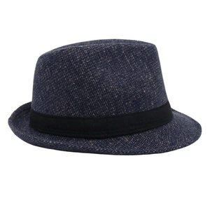Detail of navy blue wool felt Fedora hat with textured fabric and black satin ribbon band