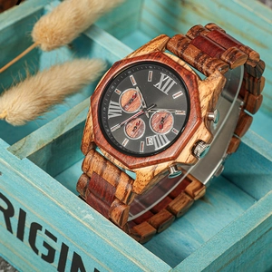 Macro view of octagonal wooden watch with functional dials and natural sandalwood texture