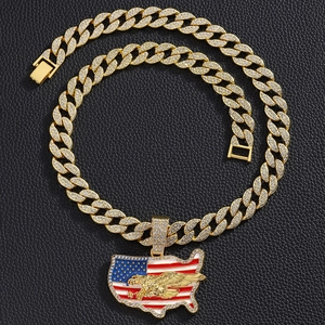 Close-up of hip-hop USA map pendant with eagle and rhinestones on gold Cuban chain