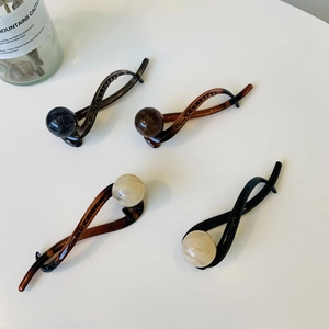 Detailed set of four elegant hair twisting clips with round beads in assorted colors