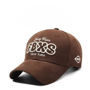 Detailed view of dark brown cotton baseball cap with white 3D embroidery text