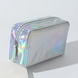 Detailed macro shot of holographic PU makeup bag with silver laser finish and zipper
