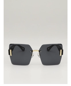 Detail of rimless diamond cut sunglasses with smoke grey lenses and gold metal accents
