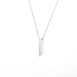 Polished silver vertical bar pendant necklace in minimalist stainless steel