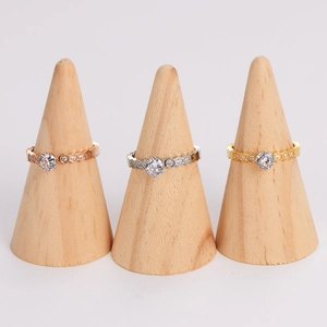 Honeycomb design rings with cubic zirconia in rose gold, silver, and gold finishes