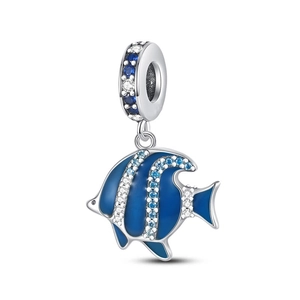 Macro shot of silver tropical fish charm with blue enamel and sparkling zircon detail