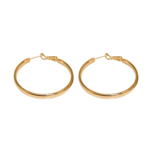 Minimalist gold geometric hoop earrings with polished finish on white background