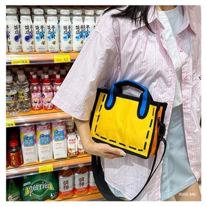 2D cartoon style yellow canvas tote bag with contrast blue handles shown in a lifestyle setting