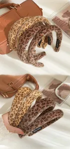 Detail view of handmade leopard print plush headband with soft faux fur texture