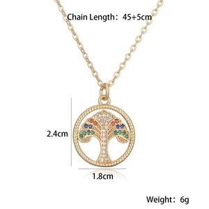 Detail view of colorful tree of life pendant with dimensions 2.4cm by 1.8cm