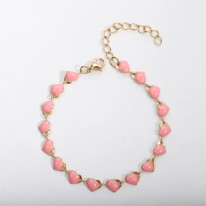 18k gold plated stainless steel bracelet featuring pink enamel hearts and adjustable chain