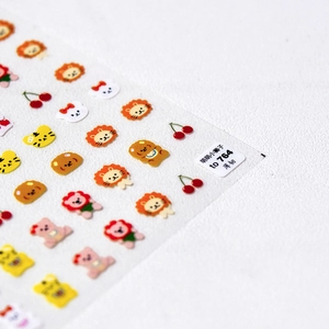 Adhesive cartoon nail stickers featuring lions and bears with thin flexible texture