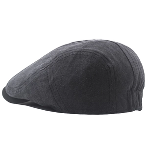 Detail view of cotton flat cap with elastic band and premium stitched texture