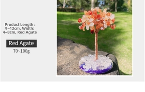 Detail of wire-wrapped red agate crystal tree on a striped purple agate base