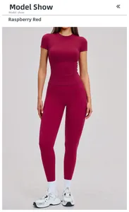 Detail of high-stretch compression yoga set in raspberry red featuring ergonomic seams
