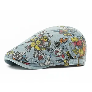 Retro denim ivy cap featuring colorful floral patterns on a light blue wash fabric