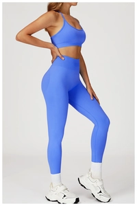 Detail of royal blue seamless high-waist yoga set with racerback sports bra and leggings