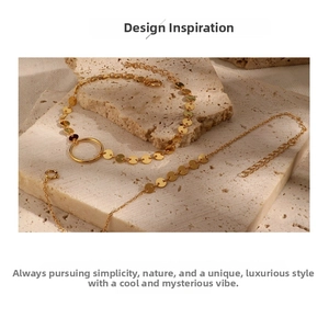 Macro view of minimalist 925 silver golden bracelet with round disk links and lobster clasp