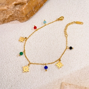 Golden stainless steel star bracelet with colorful faceted beads and star charms