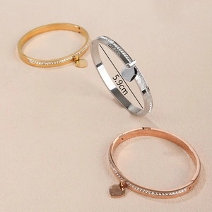 Sparkling heart pendant bangles with micro zircons in gold, silver, and rose gold finish