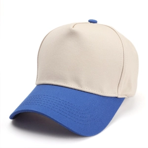 Close-up of contrast stitch on blue brim and khaki canvas crown of the baseball cap
