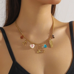 Gold stainless steel necklace with multi-charms including wings and tiger eye stones