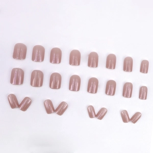 Pearlescent dusty rose press-on nails in short squoval shape, 24-piece full set
