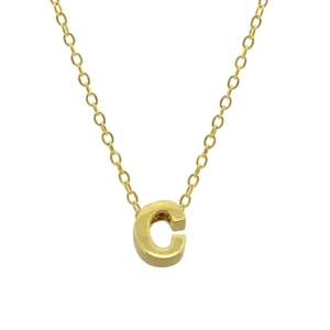 Macro shot of gold-plated 925 silver necklace featuring a polished C letter pendant
