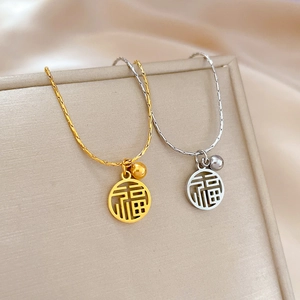 Colliers classiques en acier titane or et argent avec pendentifs évidés du caractère Fu
