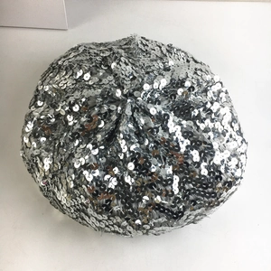 Fashionable silver sequined beret hat for women featuring a glittering metallic finish