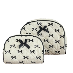 Quilted bow makeup bag set with large capacity and portable semicircular travel design