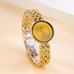 Elegant gold Miss Fox women's quartz watch with minimalist black dial and steel band