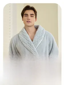 Detail of light blue coral fleece men's bathrobe with textured wheat pattern collar