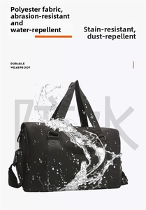 Waterproof detail of black gym bag showing water resistance on polyester fabric surface