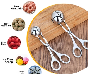 Close-up of 304 stainless steel meatball maker tool showing handle engraving and dual sizes