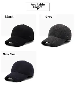 Close-up of winter baseball caps in black, grey, and navy fleece-lined wool fabric