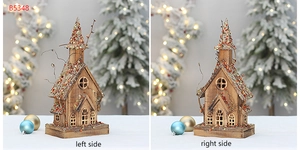 Detailed side views of a wooden Christmas church with sparkling sequins and warm lighting