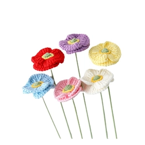 Colorful handmade crochet poppy flower bouquet with stems in red, blue, pink and yellow