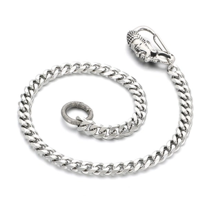 Fashionable titanium steel Cuban link jeans chain with Buddha head clasp on white backdrop