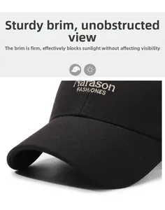 Close-up of black cotton baseball cap showing stiff brim and Narason embroidery detail