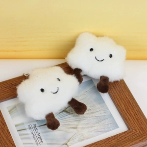Cute white cloud plush pendant toy with soft fur and embroidered face for bags