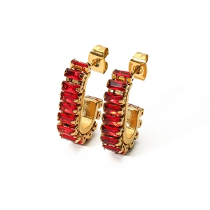 Macro shot of 18K gold-plated hoop earrings with vibrant red rectangular zircon stones